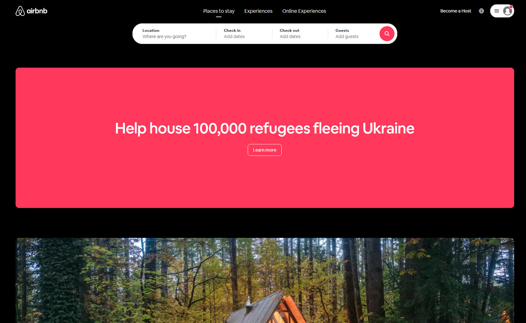 The home page of Airbnb shows a giant neon pink banner asking people to help host 100,000 Ukrainian refugees.